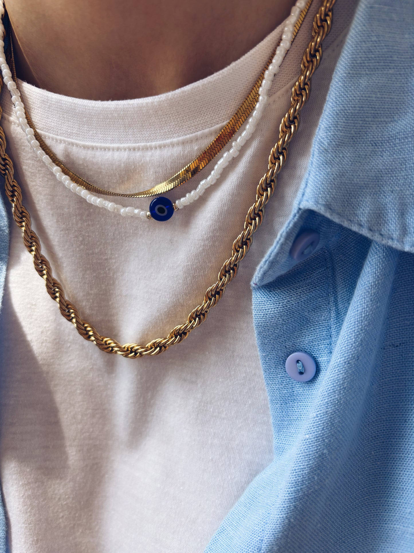 Collana con perline in vetro e occhio greco in resina
