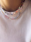 Collana con perline fluo e letterine da personalizzare - Dettagli di Moda